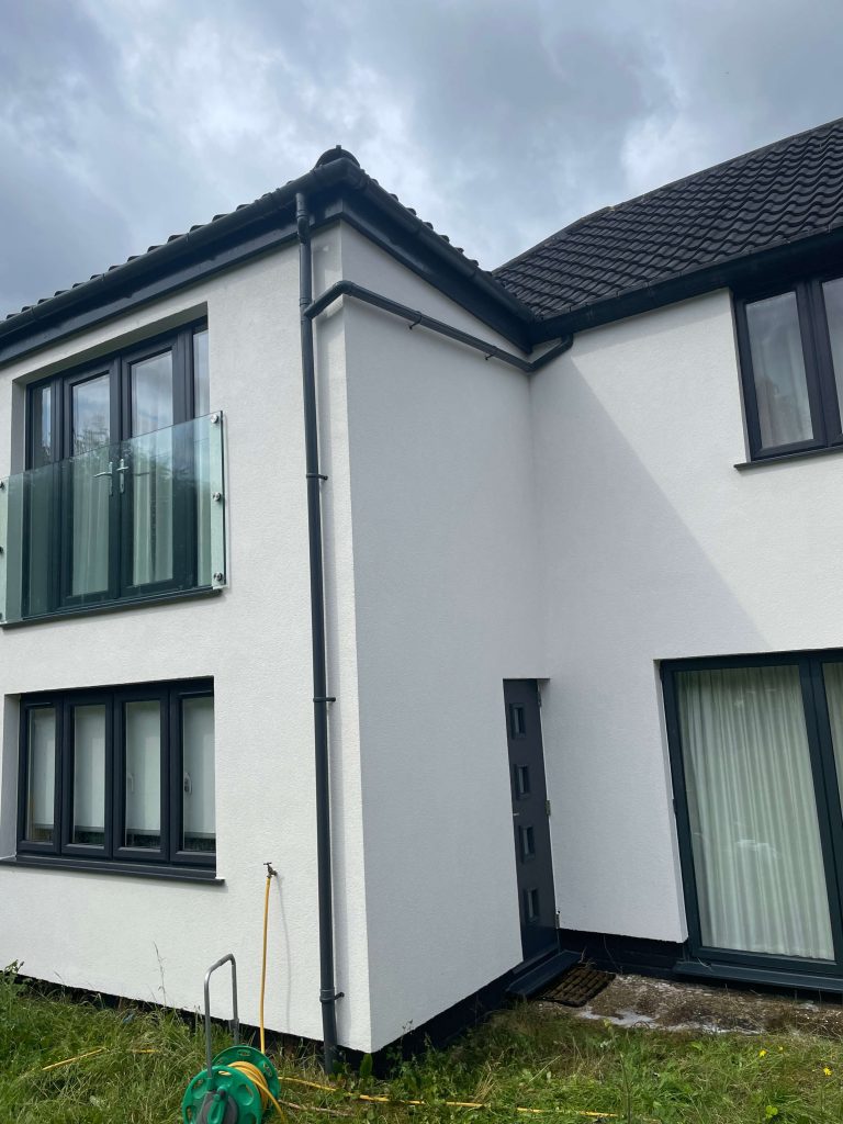 house with render cleaning in Sutton UK